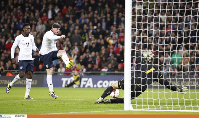 Che fatica per l'Inghilterra, poi ci pensa Rooney:  l'1-0 finir 4-1. Action Images
